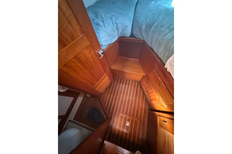 Slide: The Image of Interior of 2001 Monk Trawler with wooden flooring and cabinetry. - 64