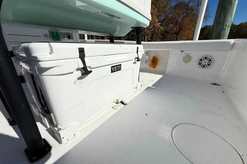 Slide: The Image of 2023 Caymas 281 HB boat deck with Yeti cooler and speaker. - 43