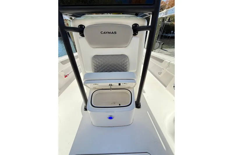 Slide: The Image of 2023 Caymas 281 HB boat interior with seating and storage compartment. - 44