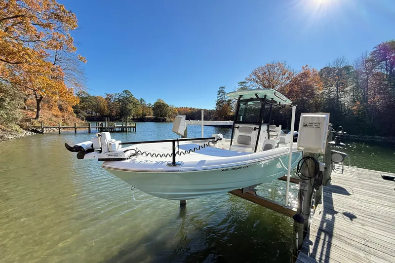 Slide: The Image of 2023 Caymas 281 HB boat docked on a sunny autumn day by the lake. - 8