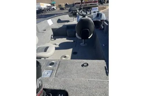Slide: The Image of 2019 Tracker Pro Guide V-175 SC boat interior with seating and steering console. - 2