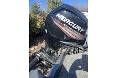 Slide: The Image of 2019 Tracker Pro Guide V-175 SC with Mercury outboard motor in outdoor setting. - 4