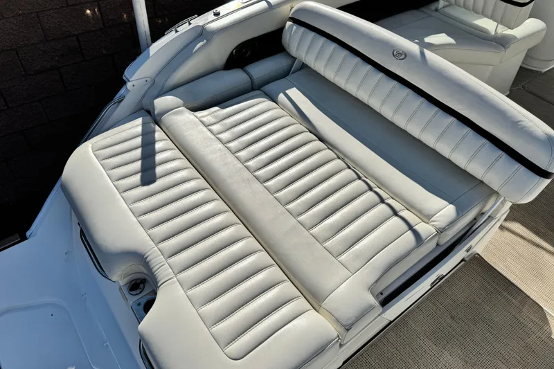 Slide: The Image of 2014 Cobalt 24SD boat with luxurious white leather seating. - 29