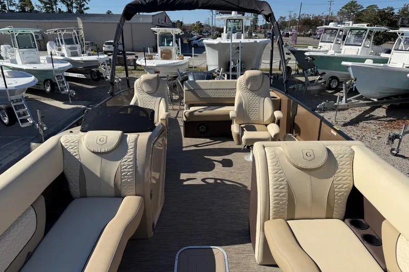 Slide: The Image of 2022 Godfrey Monaco 255 SFL pontoon boat interior on a sunny day. - 20