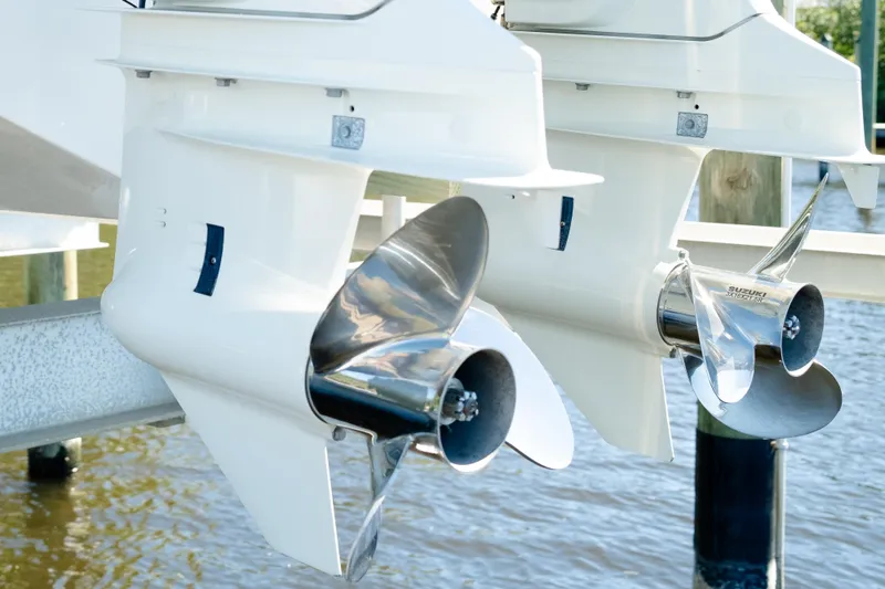 Slide: The Image of 2019 Sea Pro 259 Center Console boat with dual Suzuki outboard motors. - 4