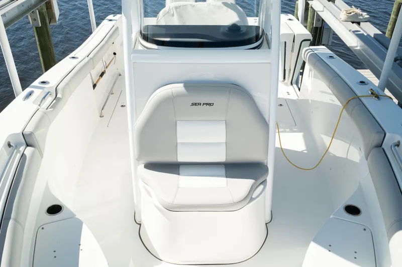 Slide: The Image of 2019 Sea Pro 259 Center Console boat interior with seating and console view. - 40