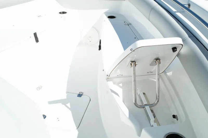 Slide: The Image of 2019 Sea Pro 259 Center Console boat interior with open storage compartment. - 49
