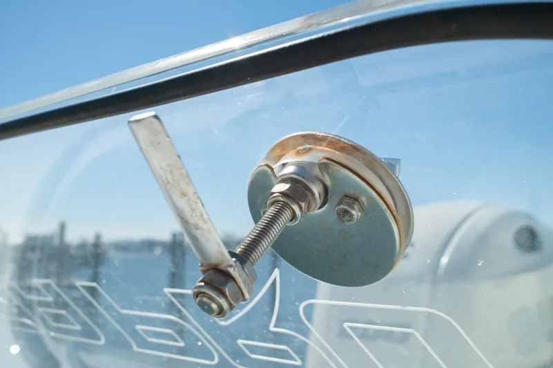 Slide: The Image of Close-up of a 2019 Sea Pro 259 Center Console boat's metal hardware. - 55