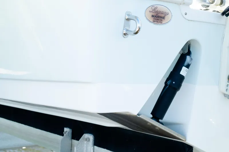 Slide: The Image of 2019 Sea Pro 259 Center Console boat detail with Legacy Marine badge. - 6