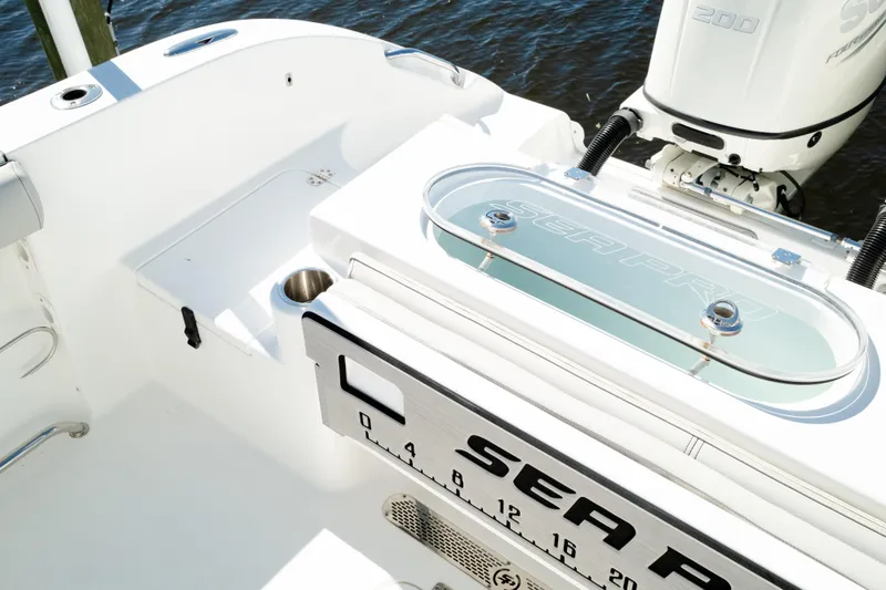 Slide: The Image of 2019 Sea Pro 259 Center Console boat with outboard motor and livewell. - 8