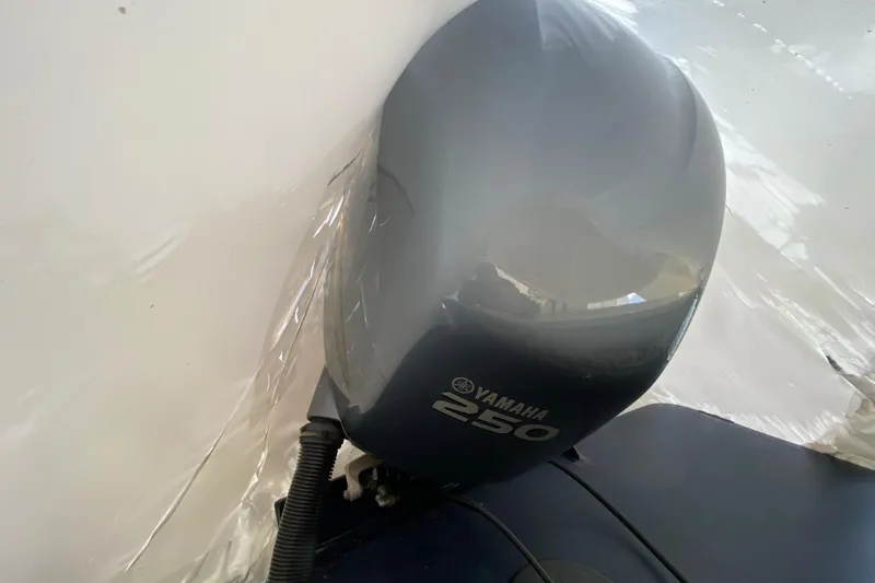 Slide: The Image of Yamaha 250 outboard motor on 2007 Roth Bilt 24 CC boat. - 29