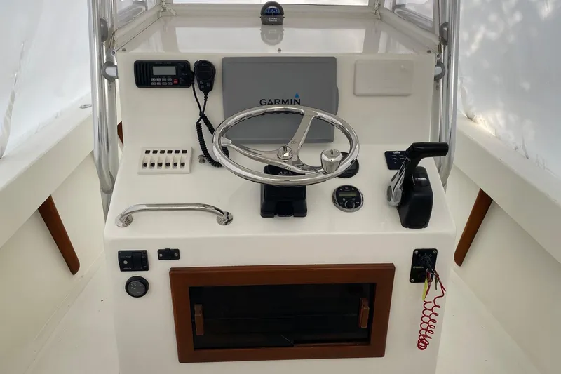 Slide: The Image of Center console of a 2007 Roth Bilt 24 CC boat with Garmin navigation. - 6