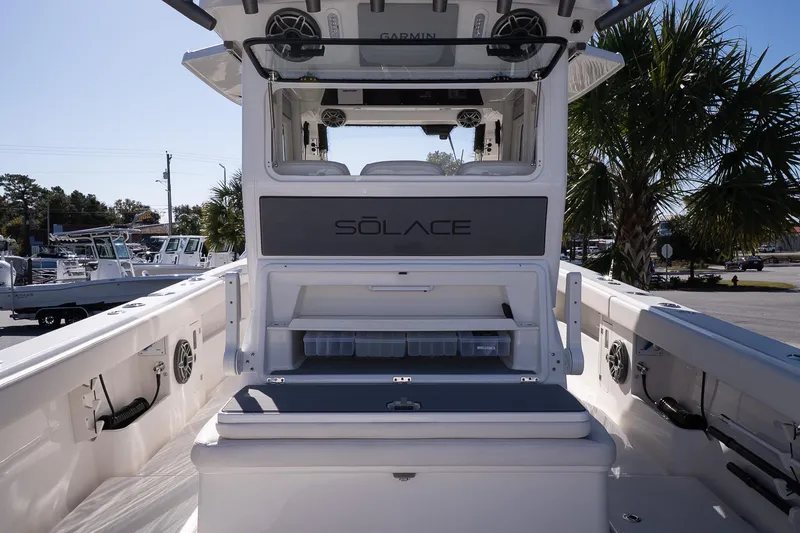 Slide: The Image of 2026 Solace 37 Pilot boat interior with storage compartments and seating. - 13
