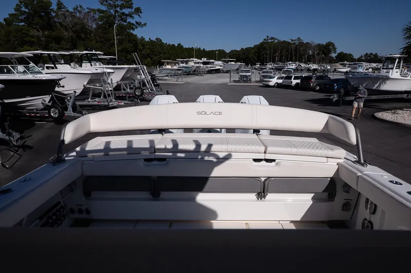 Slide: The Image of 2026 Solace 37 Pilot boat displayed in a marina with multiple boats. - 15