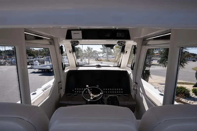 Slide: The Image of Interior view of 2026 Solace 37 Pilot boat cockpit with steering wheel. - 20