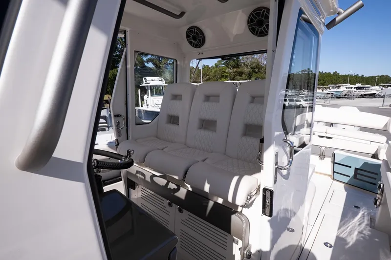 Slide: The Image of Interior of 2026 Solace 37 Pilot boat with luxurious seating and modern design. - 23