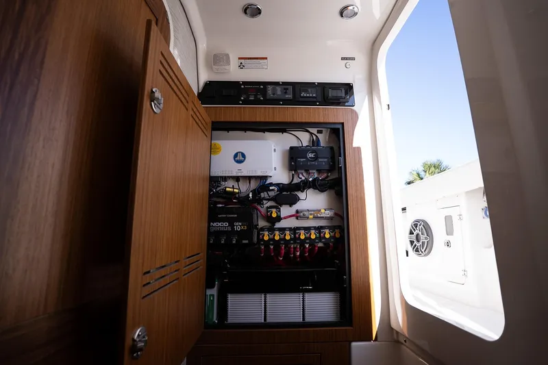 Slide: The Image of Electrical panel inside 2026 Solace 37 Pilot boat, showcasing wiring and components. - 34