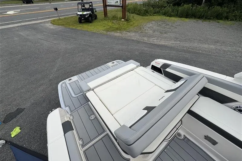 Slide: The Image of 2025 Chaparral 267 SSX boat with sleek seating and modern design. - 12