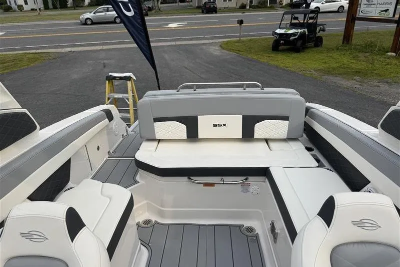 Slide: The Image of 2025 Chaparral 267 SSX boat interior with stylish seating and modern design. - 24