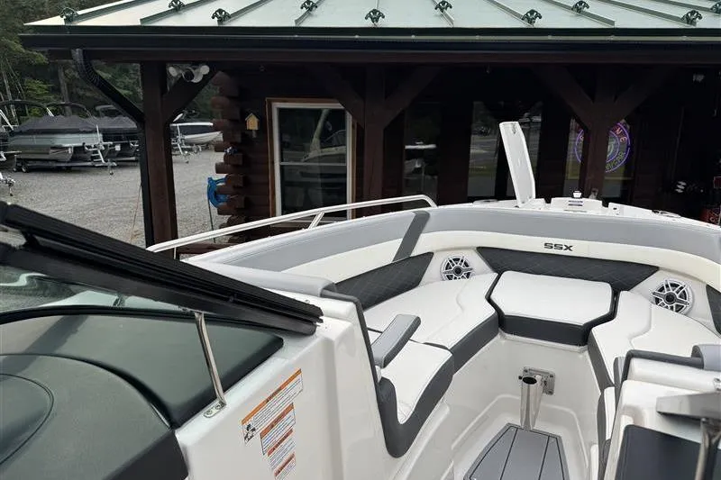 Slide: The Image of 2025 Chaparral 267 SSX boat interior with sleek seating and modern design. - 7