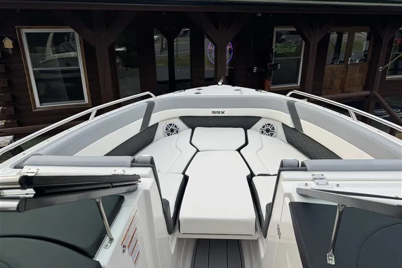 Slide: The Image of 2025 Chaparral 267 SSX boat interior with sleek seating and modern design. - 8