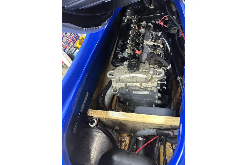 Slide: The Image of 2011 Yamaha WaveRunner VX Cruiser engine compartment, showcasing internal components and wiring. - 12