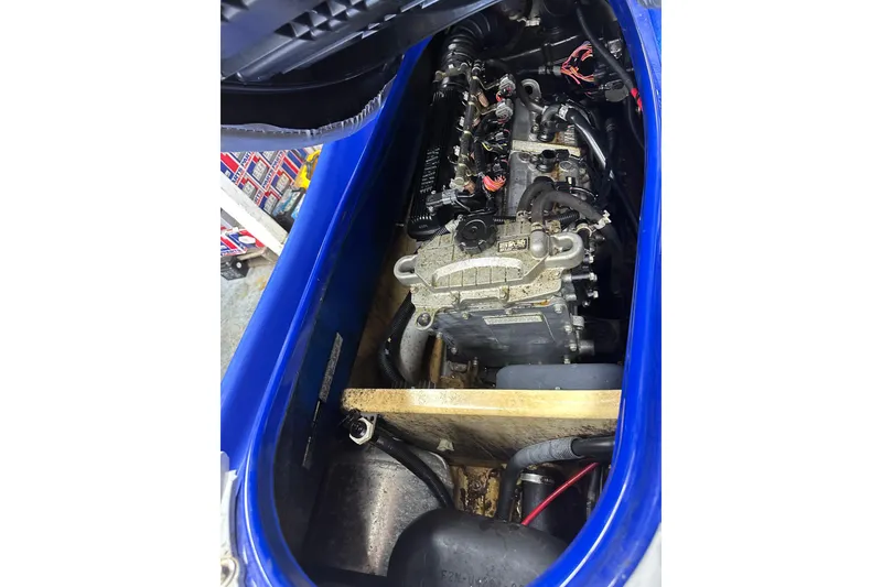 Slide: The Image of 2011 Yamaha WaveRunner VX Cruiser engine compartment, showcasing internal components and wiring. - 13