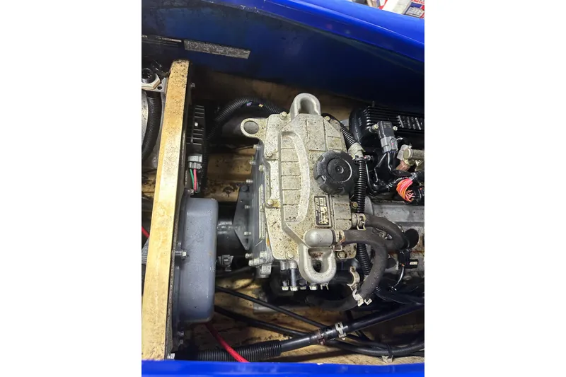 Slide: The Image of Engine compartment of a 2011 Yamaha WaveRunner VX Cruiser, showcasing internal components. - 14