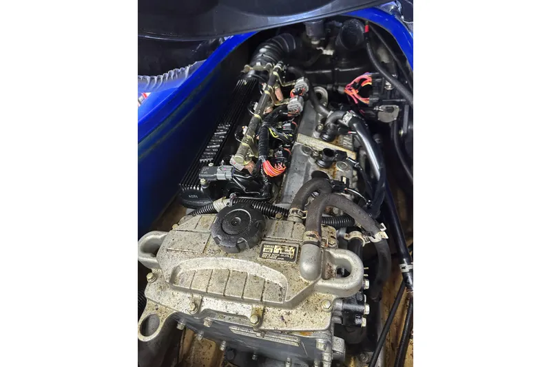 Slide: The Image of Engine of a 2011 Yamaha WaveRunner VX Cruiser, showcasing internal components and wiring. - 15