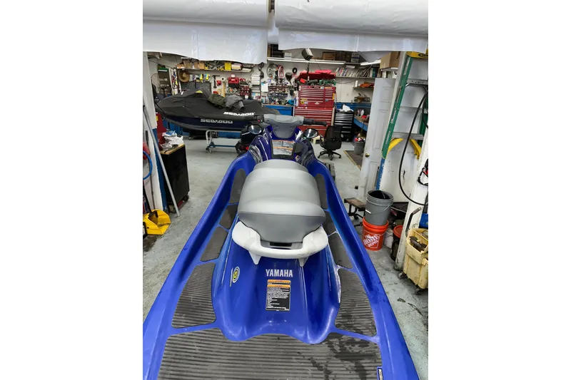 Slide: The Image of 2011 Yamaha WaveRunner VX Cruiser in a workshop setting. - 6
