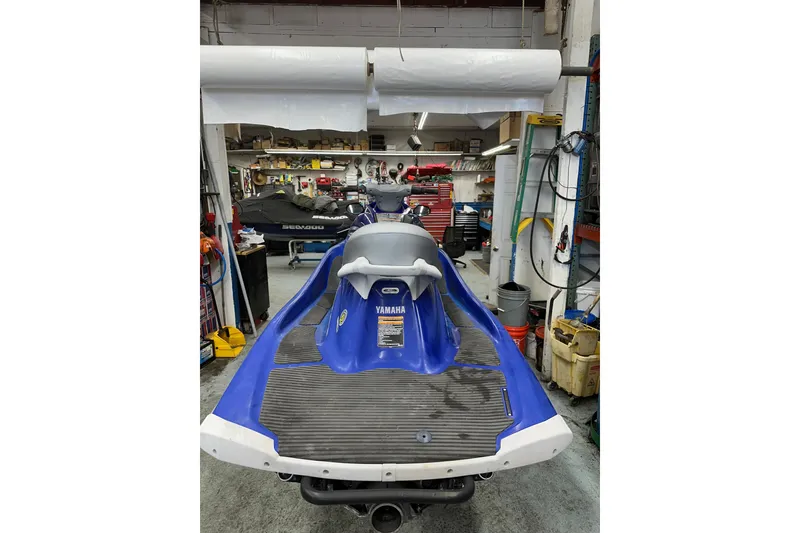 Slide: The Image of 2011 Yamaha WaveRunner VX Cruiser in a workshop setting, rear view. - 7