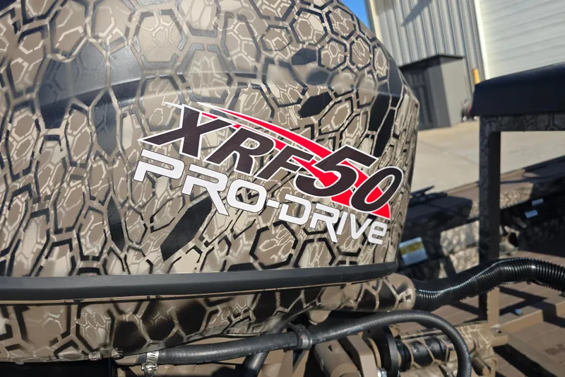 Slide: The Image of Pro-Drive XRF50 engine with camouflage design on 2026 model 1856 SBX TD. - 13