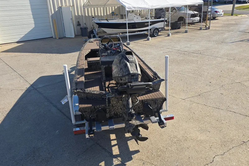 Slide: The Image of 2026 Pro-Drive 1856 SBX TD boat on trailer in parking lot. - 5