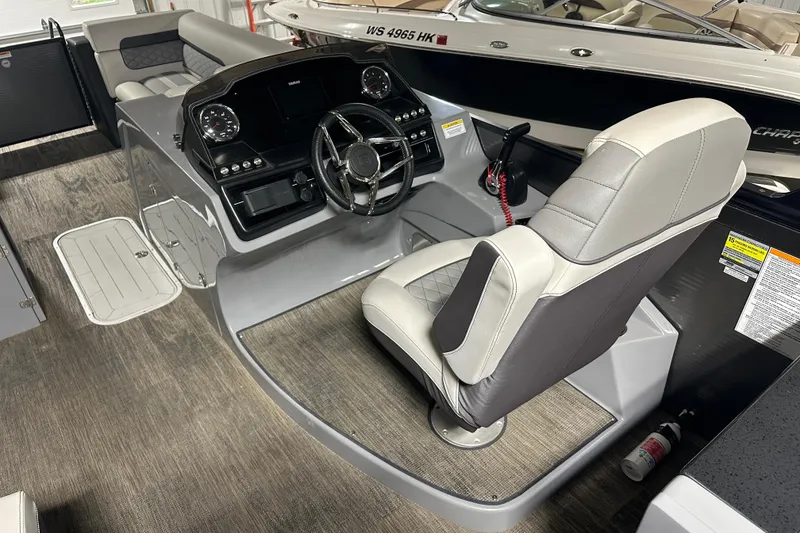 Slide: The Image of 2021 Godfrey Sanpan 2600 SBC boat interior with modern helm and seating. - 9