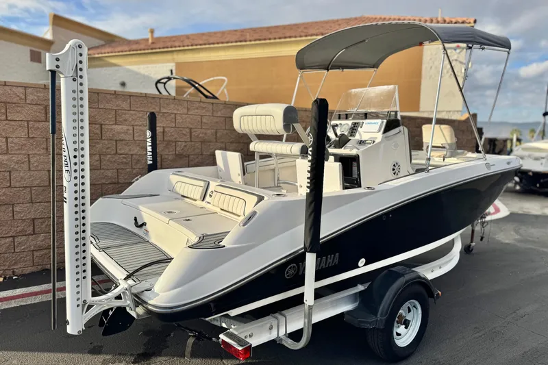 Slide: The Image of 2016 Yamaha Boats 190 FSH Deluxe on trailer, featuring sleek design and modern amenities. - 5