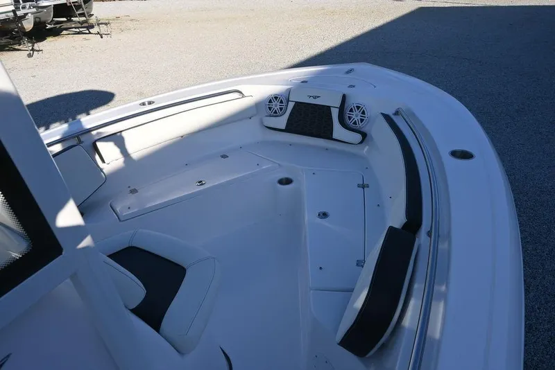 Slide: The Image of 2026 Tidewater 210 LXF boat interior with seating and speakers. - 17
