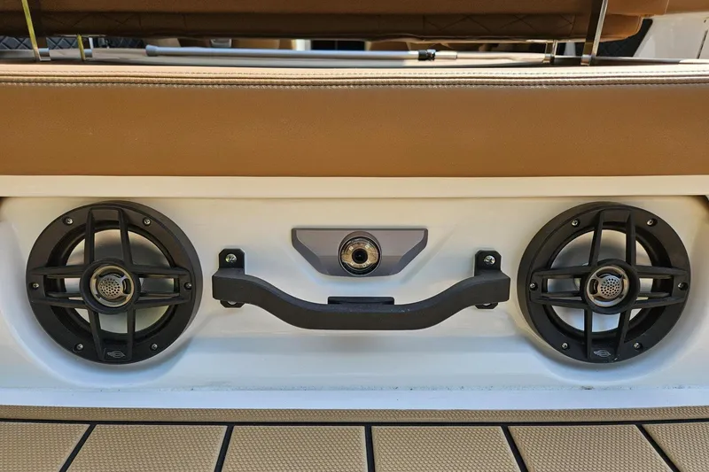 Slide: The Image of 2025 Chaparral 267 SSX boat speakers and handle on deck. - 33