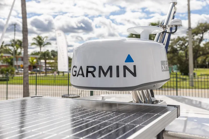 Slide: The Image of Garmin radar on 2025 Cutwater C-288 Coupe LE boat, sunny day background. - 13