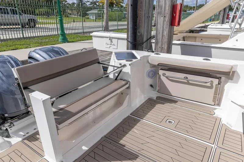 Slide: The Image of 2025 Cutwater C-288 Coupe LE boat interior with seating and storage. - 9