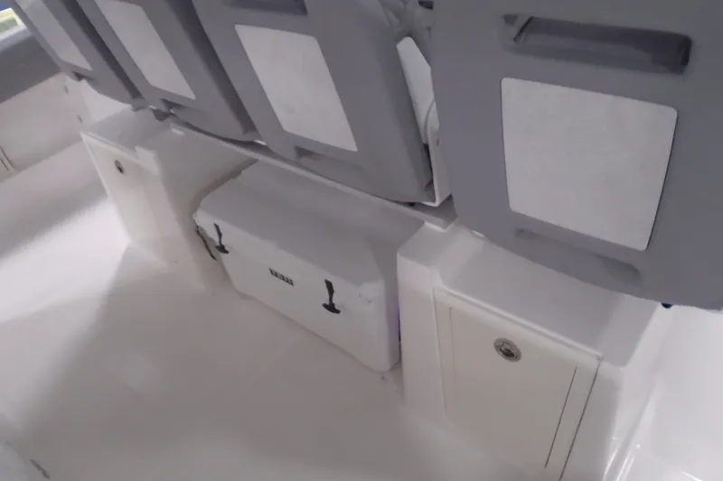 Slide: The Image of 2026 Regal 38 SAV boat interior with seating and storage compartments. - 19