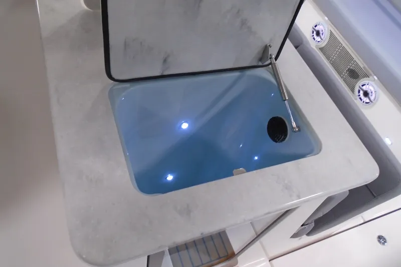 Slide: The Image of Marble countertop with sink on 2026 Regal 38 SAV boat interior. - 26