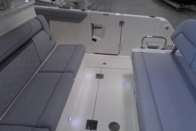 Slide: The Image of 2026 Regal 38 SAV boat interior with sleek seating and modern design. - 30