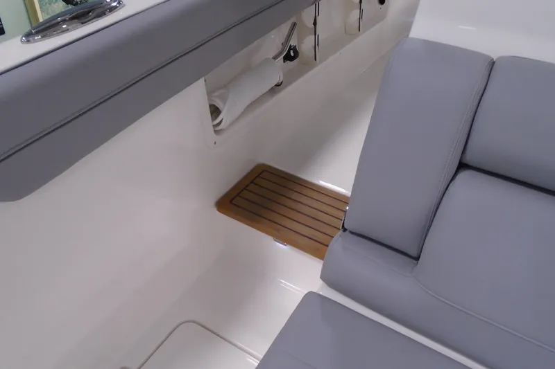 Slide: The Image of 2026 Regal 38 SAV interior with gray seating and wooden floor detail. - 32