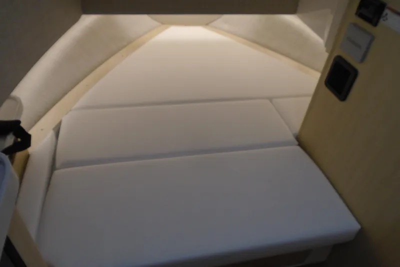 Slide: The Image of Interior cabin of 2026 Regal 38 SAV boat with cushioned seating. - 37