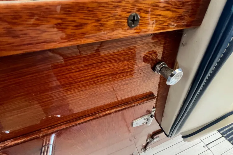 Slide: The Image of Polished wood detail on 1984 Skiff Craft 26 Runabout boat interior. - 14