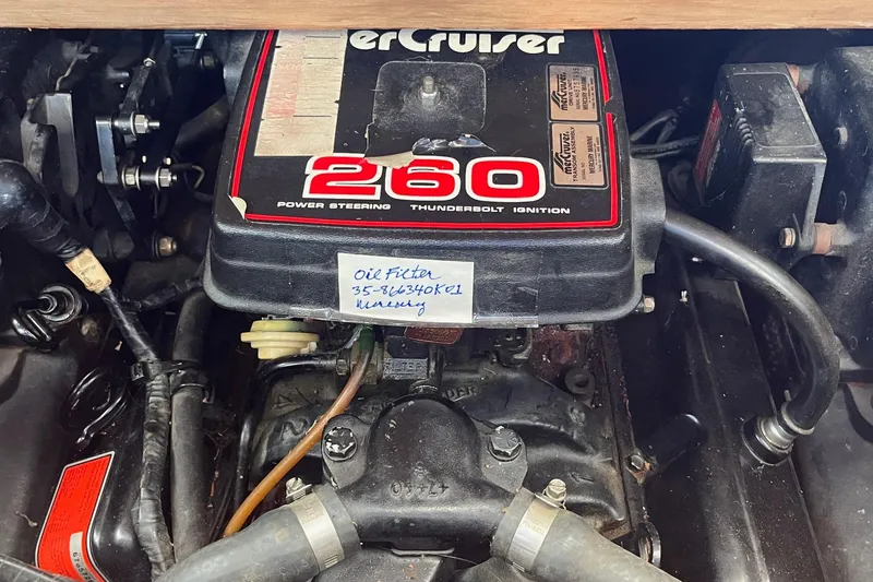 Slide: The Image of Engine of 1984 Skiff Craft 26 Runabout with MerCruiser 260 power steering. - 28