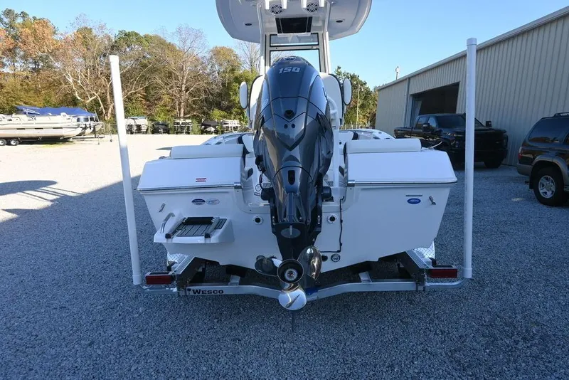 Slide: The Image of 2026 Tidewater 198 CC Adventure boat with outboard motor on trailer. - 7
