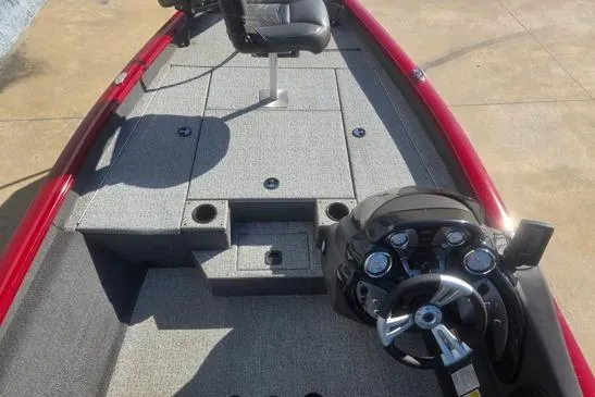 Slide: The Image of 2020 Tracker Pro Team 175 TXW Tournament Edition boat interior with steering console and seating. - 9