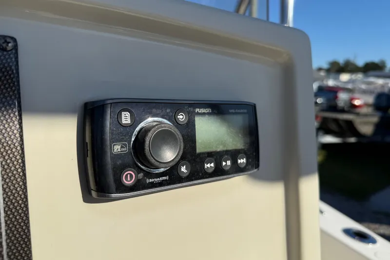 Slide: The Image of Fusion marine stereo on 2016 Pioneer 180 Islander boat dashboard. - 15