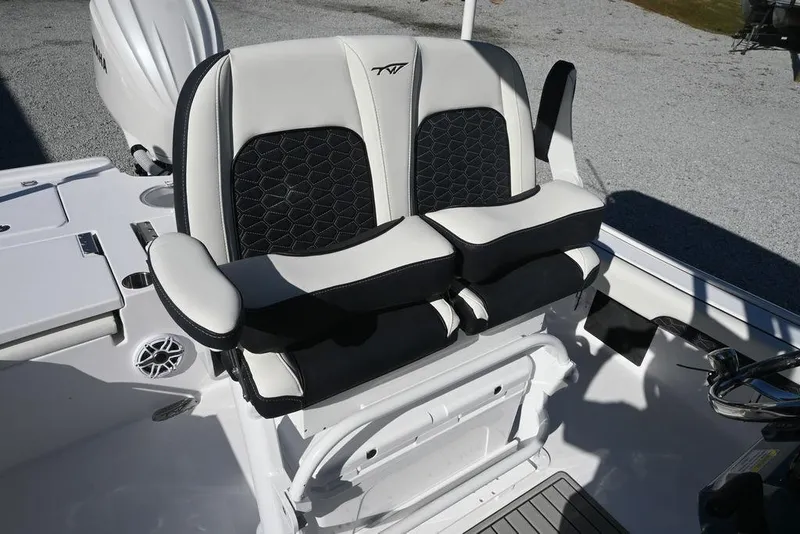 Slide: The Image of Luxury seating on 2026 Tidewater 2500 Carolina Bay boat, featuring sleek design and comfort. - 12